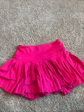 pink gold hinge tennis skirt